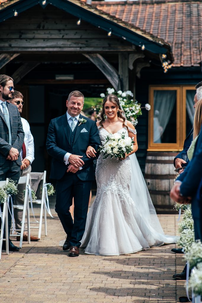 Outdoor Maidens Barn wedding with Singing Waiters Best Essex Wedding Photographer