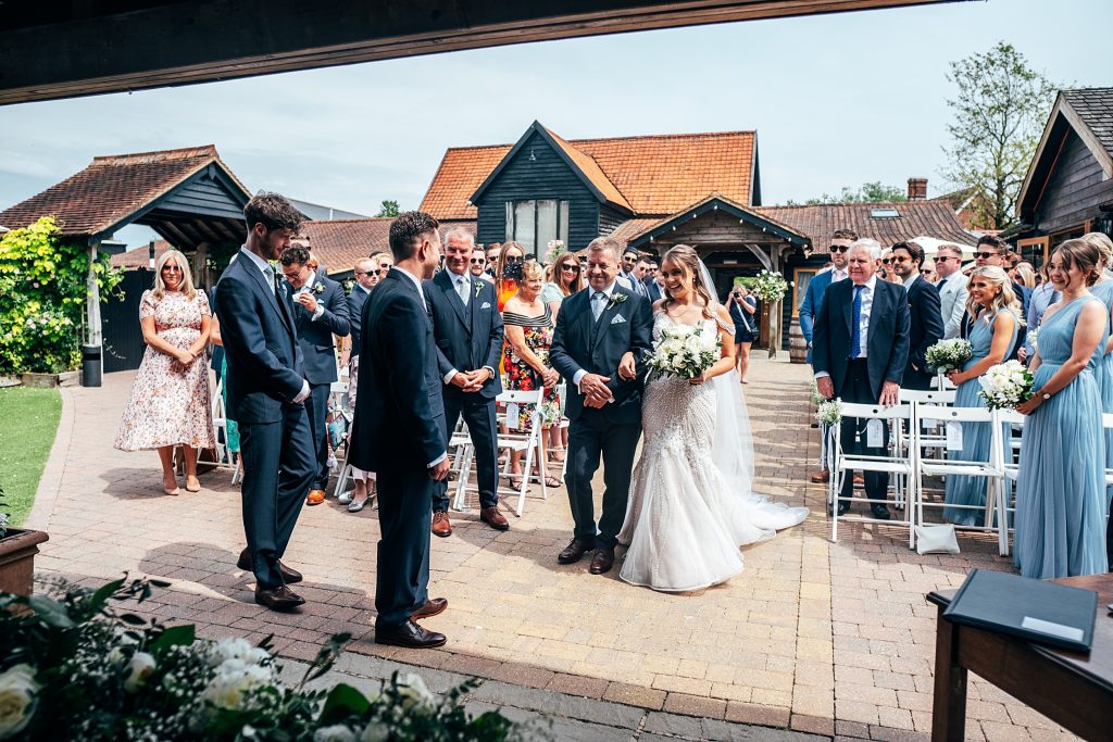 Outdoor Maidens Barn wedding with Singing Waiters Best Essex Wedding Photographer