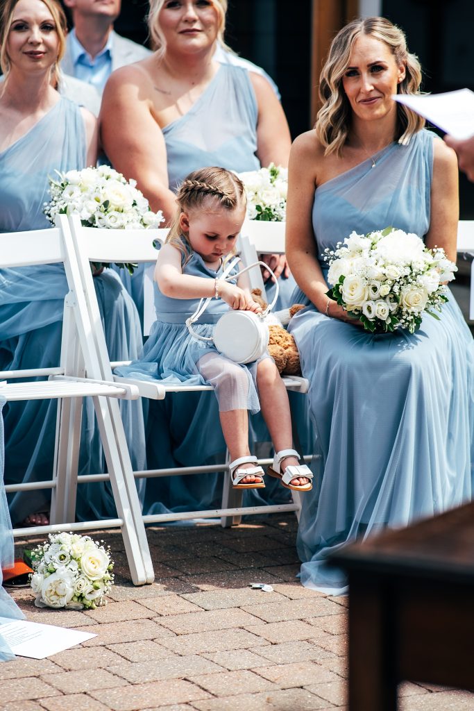 Outdoor Maidens Barn wedding with Singing Waiters Best Essex Wedding Photographer