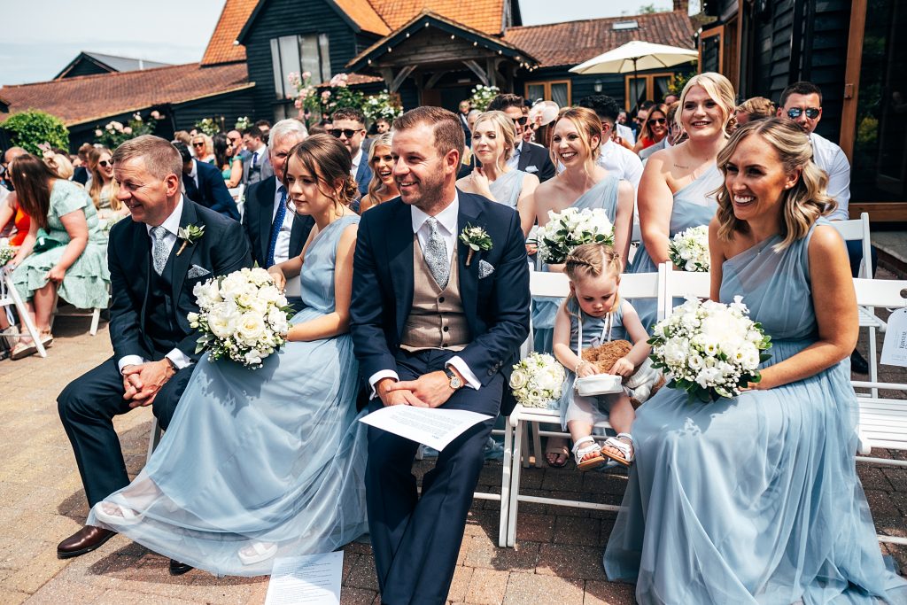 Outdoor Maidens Barn wedding with Singing Waiters Best Essex Wedding Photographer