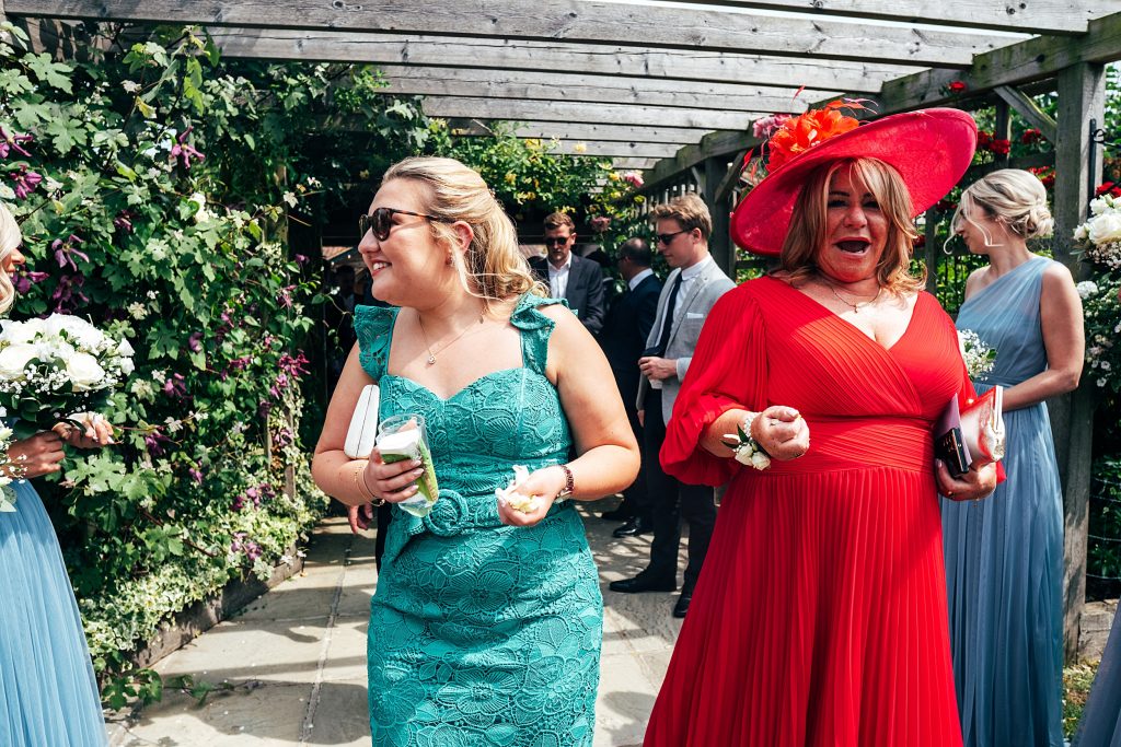 Outdoor Maidens Barn wedding with Singing Waiters Best Essex Wedding Photographer