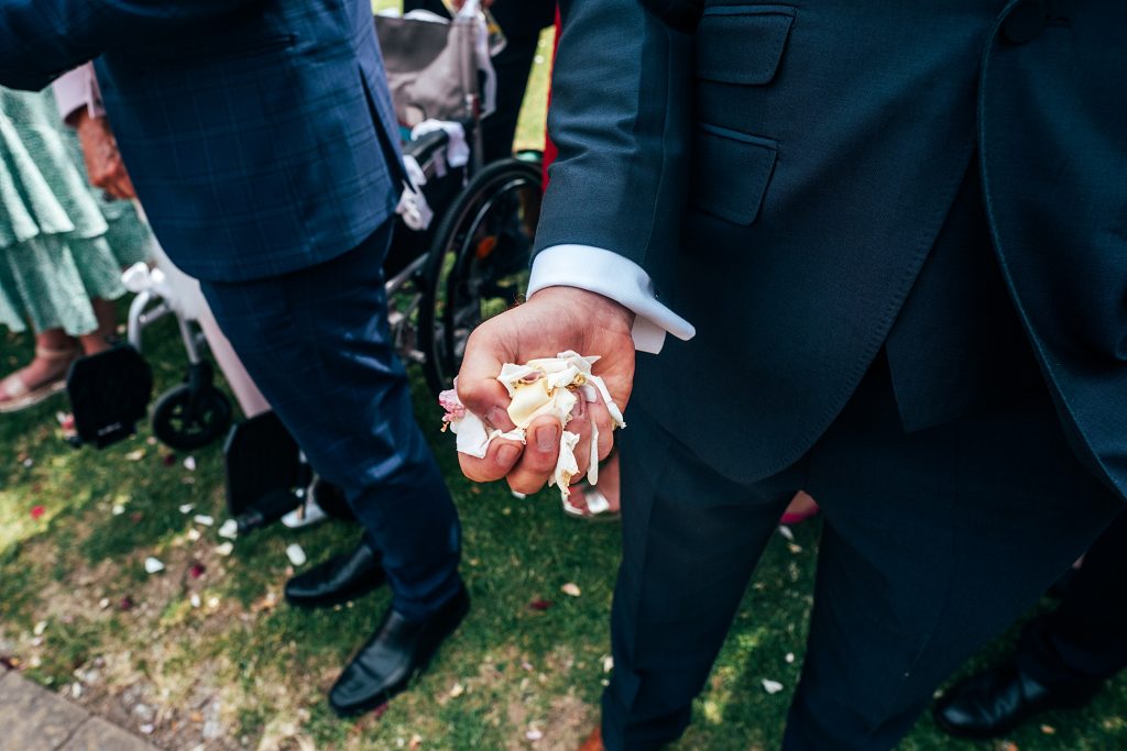 Outdoor Maidens Barn wedding with Singing Waiters Best Essex Wedding Photographer