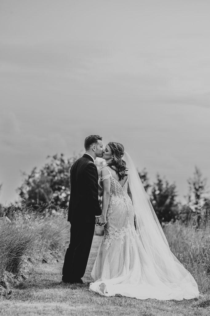 Outdoor Maidens Barn wedding with Singing Waiters Best Essex Wedding Photographer