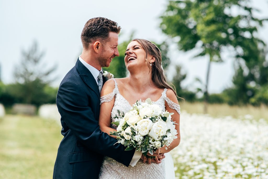 Outdoor Maidens Barn wedding with Singing Waiters Best Essex Wedding Photographer