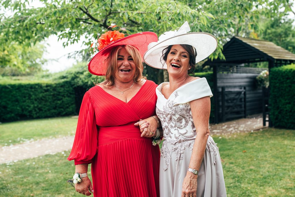 Outdoor Maidens Barn wedding with Singing Waiters Best Essex Wedding Photographer
