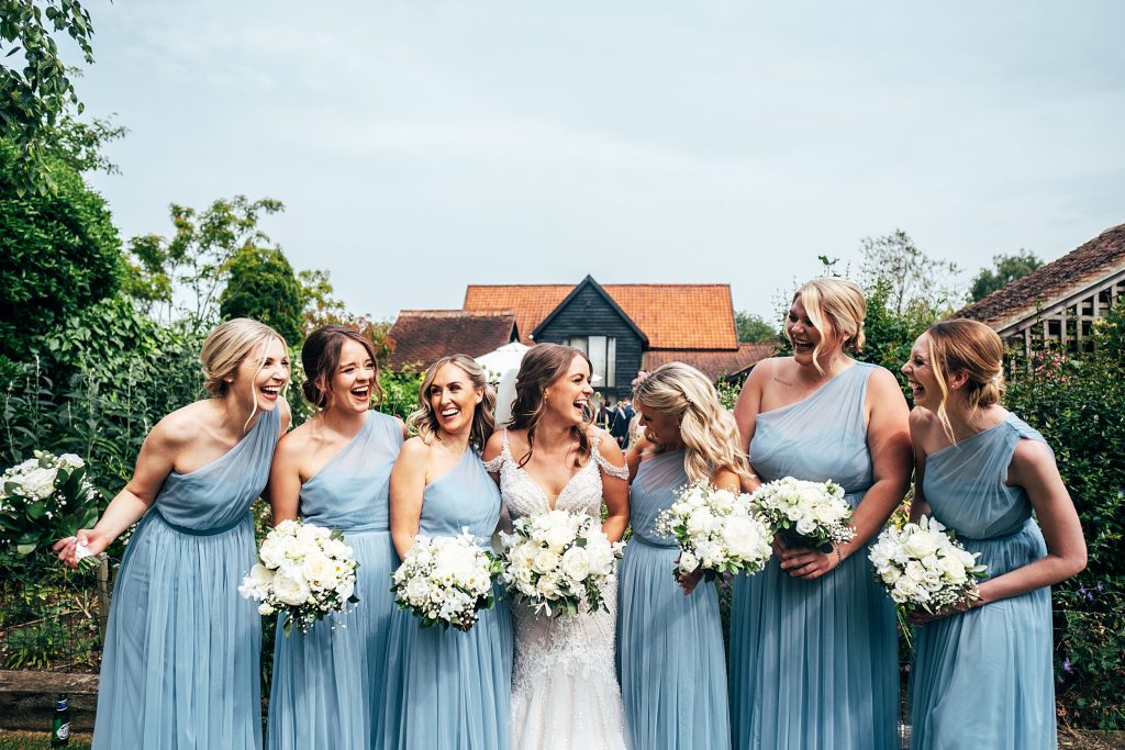 Outdoor Maidens Barn wedding with Singing Waiters Best Essex Wedding Photographer