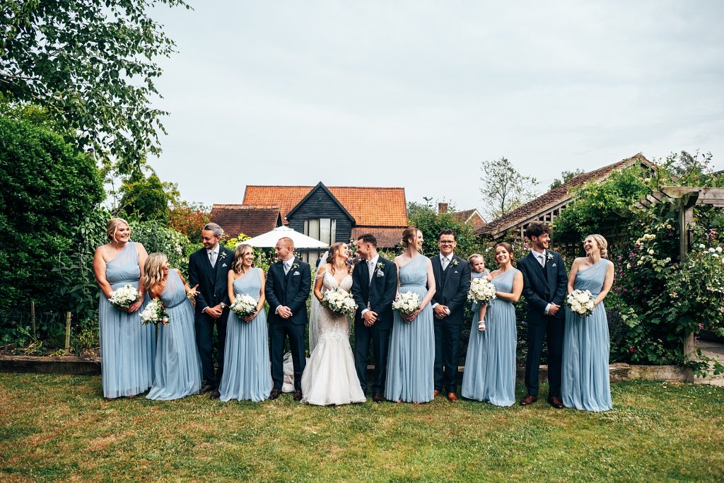 Outdoor Maidens Barn wedding with Singing Waiters Best Essex Wedding Photographer