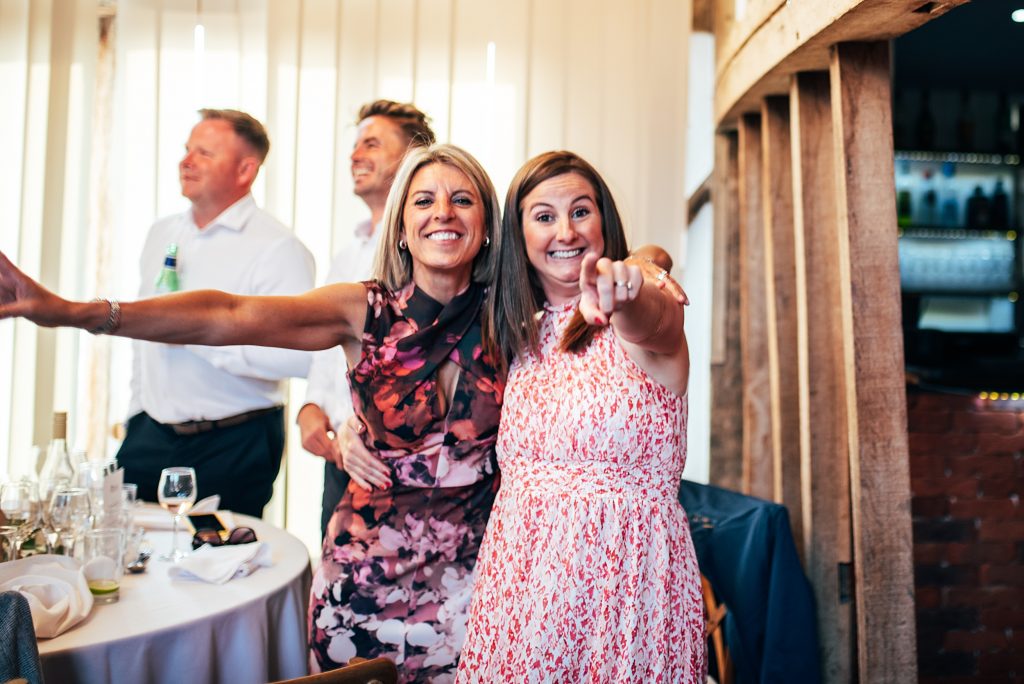 Outdoor Maidens Barn wedding with Singing Waiters Best Essex Wedding Photographer