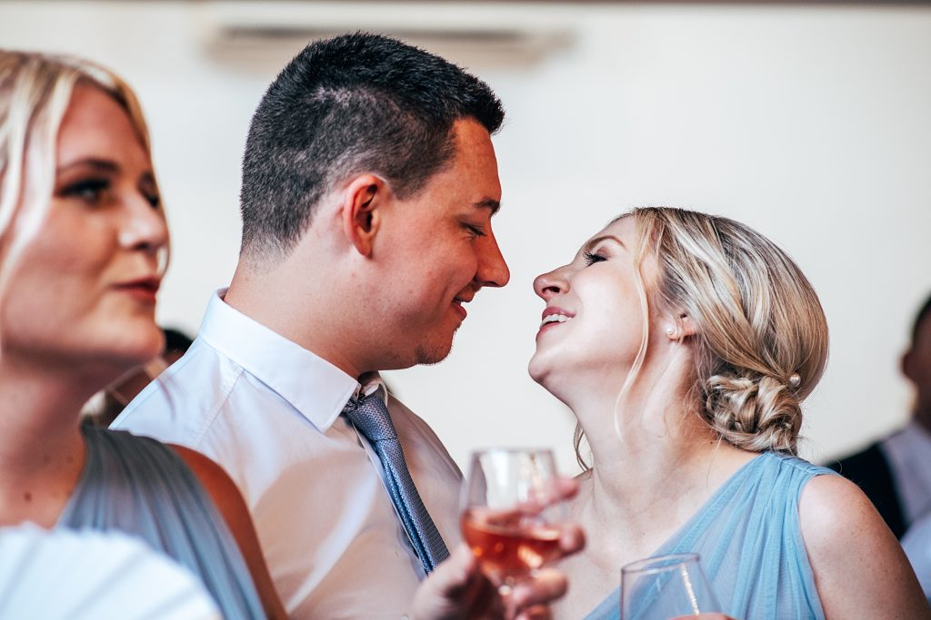 Outdoor Maidens Barn wedding with Singing Waiters Best Essex Wedding Photographer