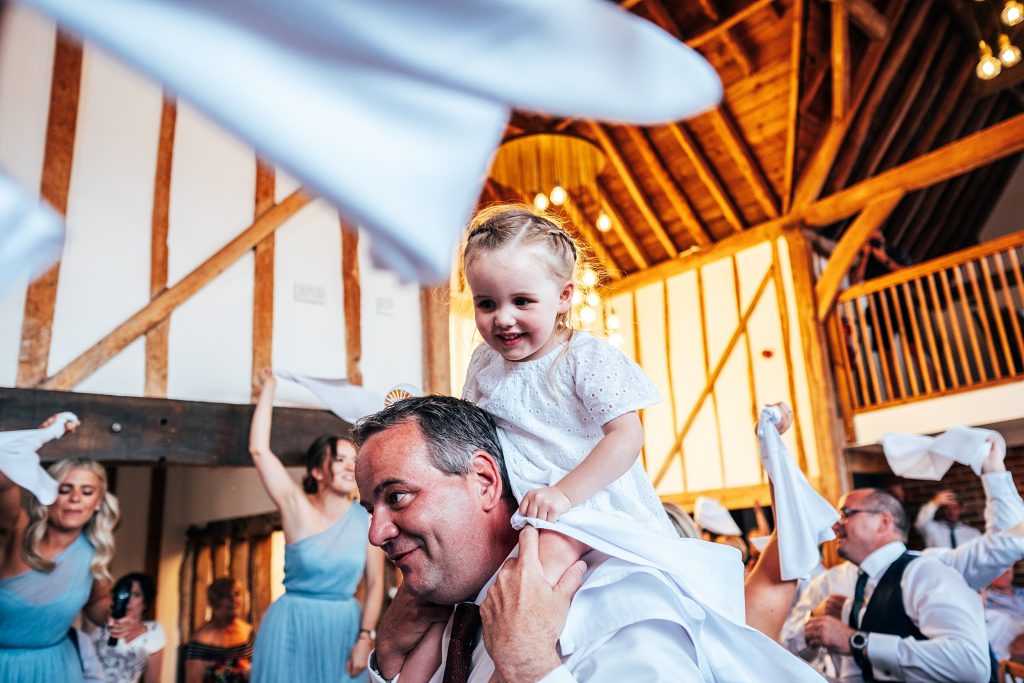 Outdoor Maidens Barn wedding with Singing Waiters Best Essex Wedding Photographer