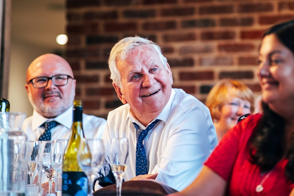 Outdoor Maidens Barn wedding with Singing Waiters Best Essex Wedding Photographer