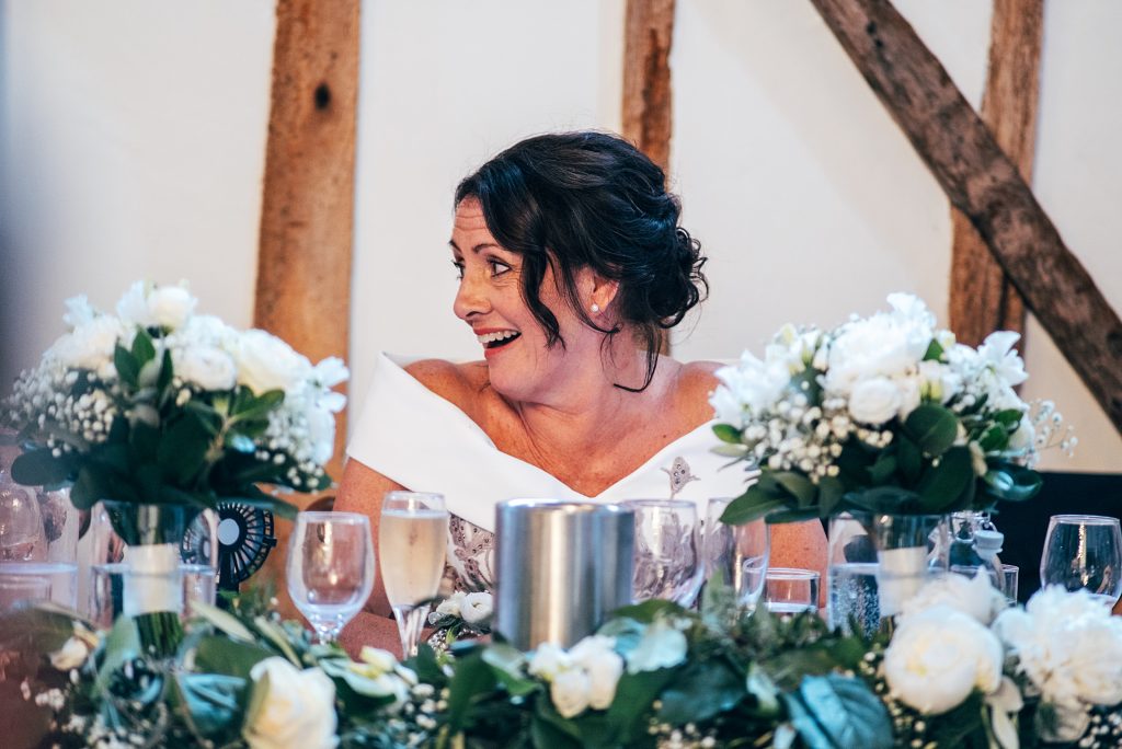 Outdoor Maidens Barn wedding with Singing Waiters Best Essex Wedding Photographer