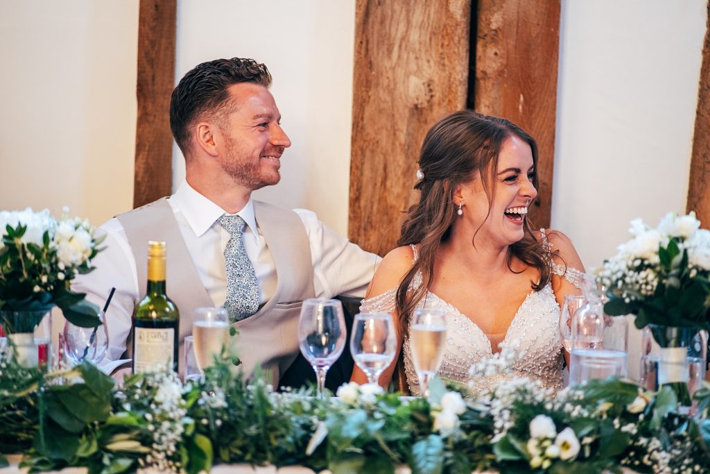 Outdoor Maidens Barn wedding with Singing Waiters Best Essex Wedding Photographer