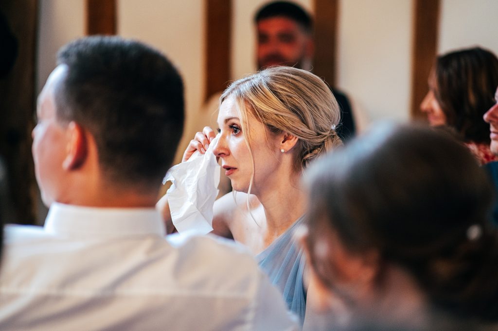 Outdoor Maidens Barn wedding with Singing Waiters Best Essex Wedding Photographer