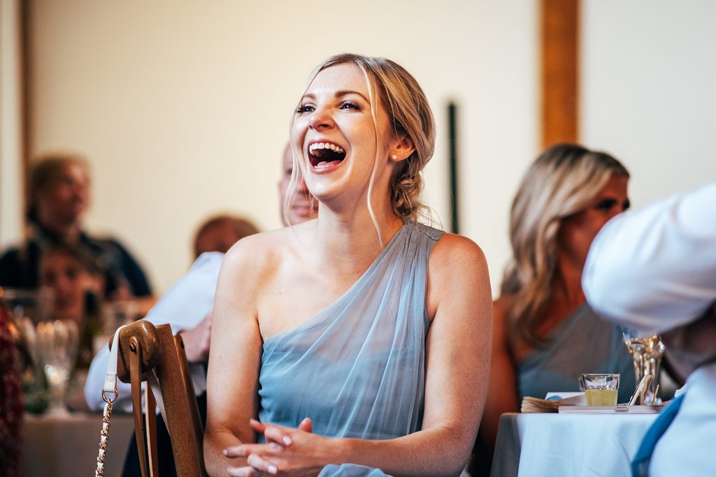 Outdoor Maidens Barn wedding with Singing Waiters Best Essex Wedding Photographer