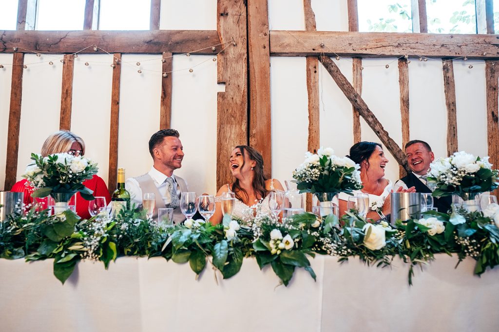 Outdoor Maidens Barn wedding with Singing Waiters Best Essex Wedding Photographer