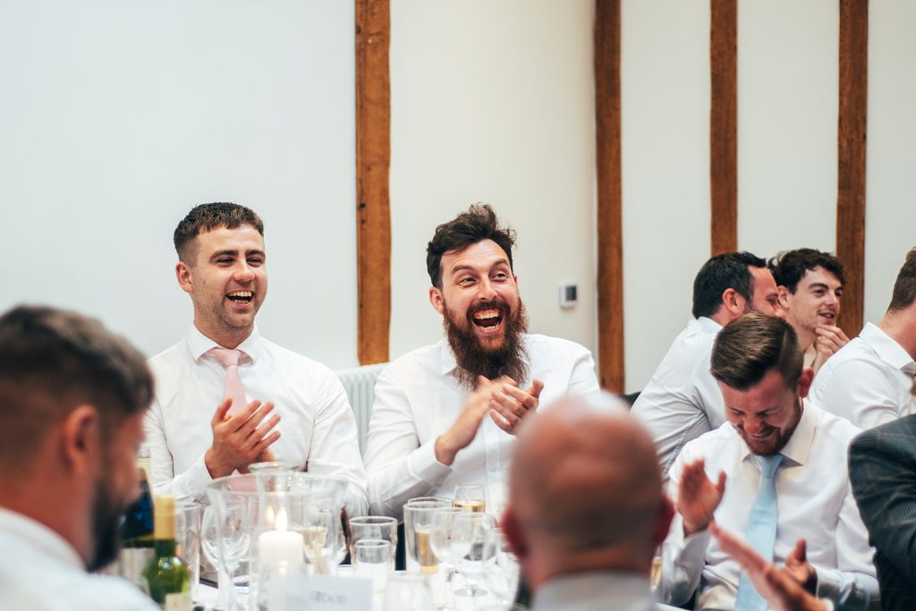 Outdoor Maidens Barn wedding with Singing Waiters Best Essex Wedding Photographer