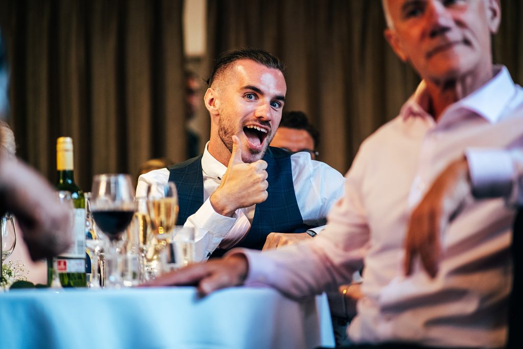 Outdoor Maidens Barn wedding with Singing Waiters Best Essex Wedding Photographer