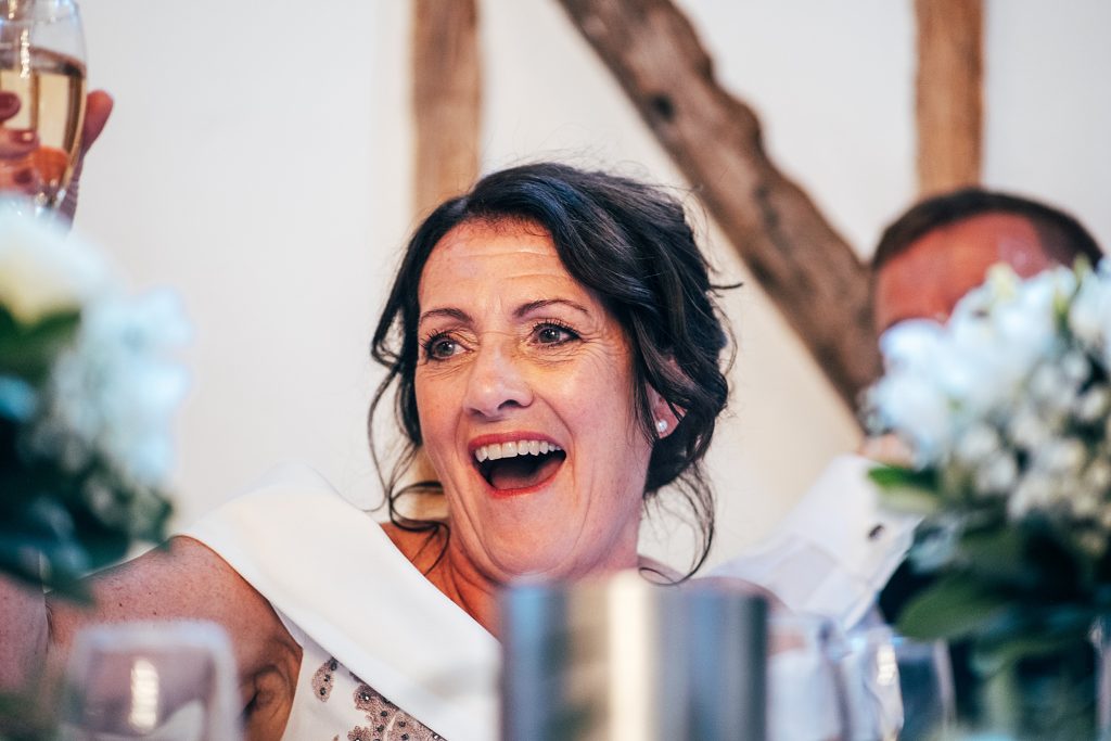 Outdoor Maidens Barn wedding with Singing Waiters Best Essex Wedding Photographer
