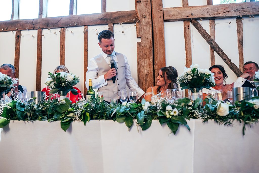 Outdoor Maidens Barn wedding with Singing Waiters Best Essex Wedding Photographer