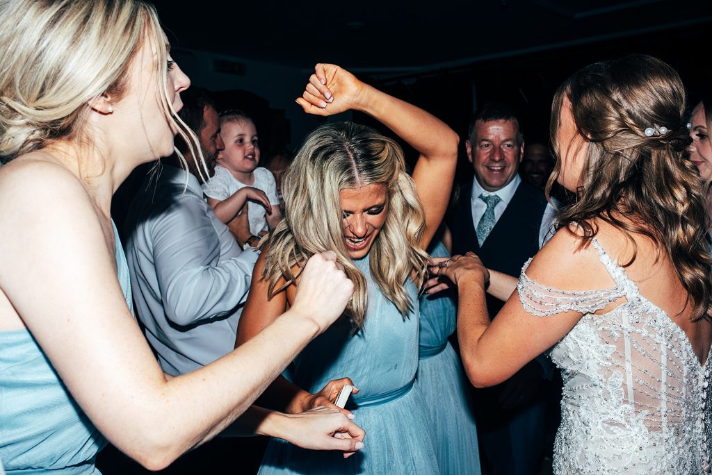 Outdoor Maidens Barn wedding with Singing Waiters Best Essex Wedding Photographer