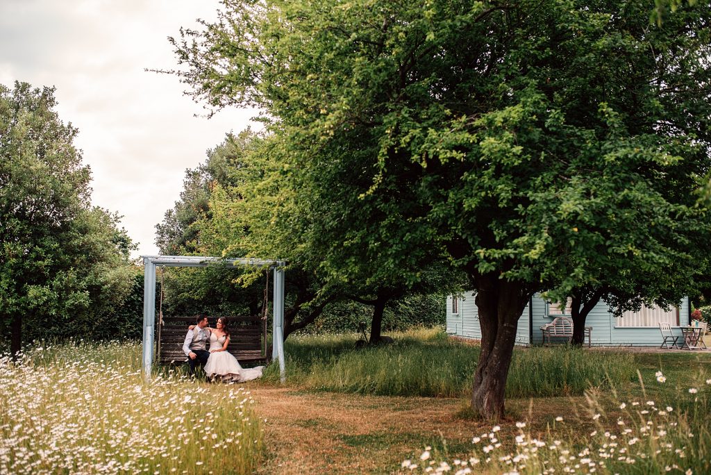Outdoor Maidens Barn wedding with Singing Waiters Best Essex Wedding Photographer