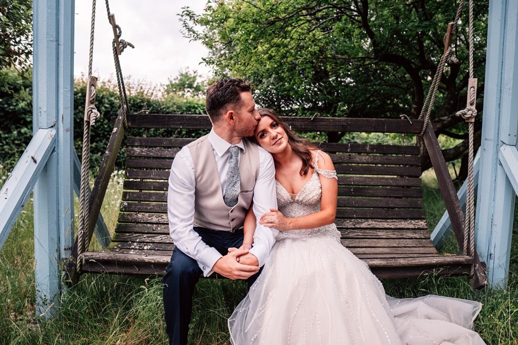 Outdoor Maidens Barn wedding with Singing Waiters Best Essex Wedding Photographer