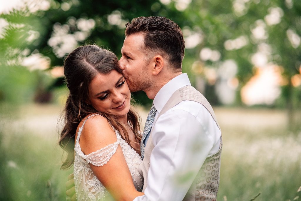 Outdoor Maidens Barn wedding with Singing Waiters Best Essex Wedding Photographer