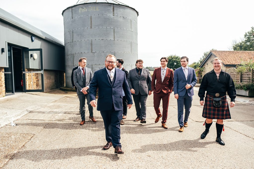 Groom and groomsmen arrive at Barns at Lodge Farm