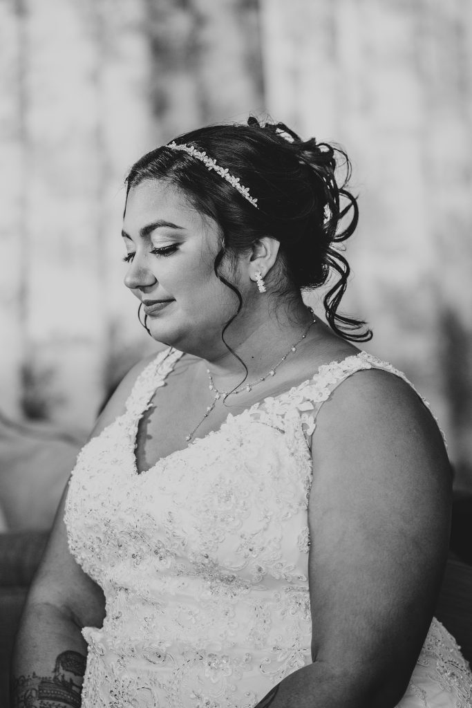 bride is ready for her ceremony, waiting in prep room