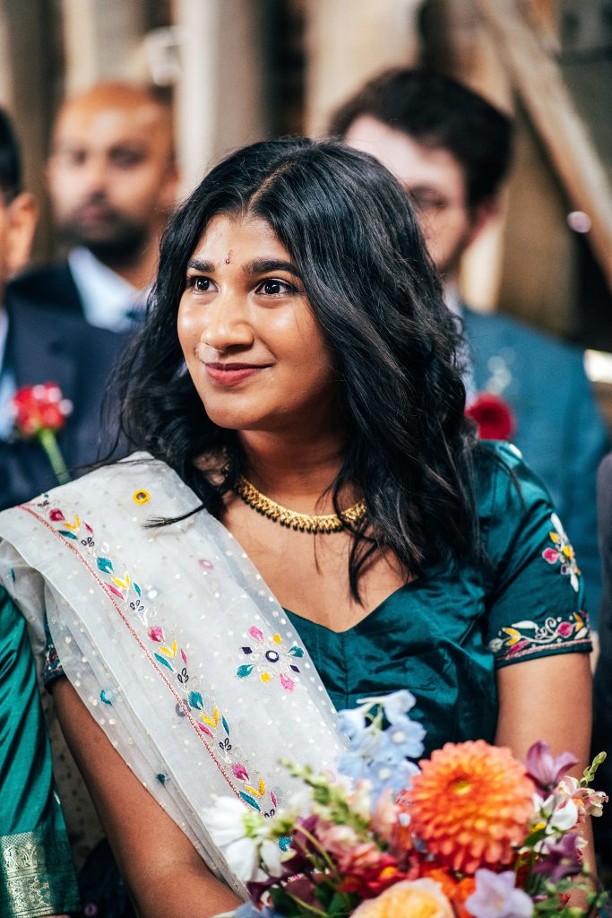 brides sister watches ceremony