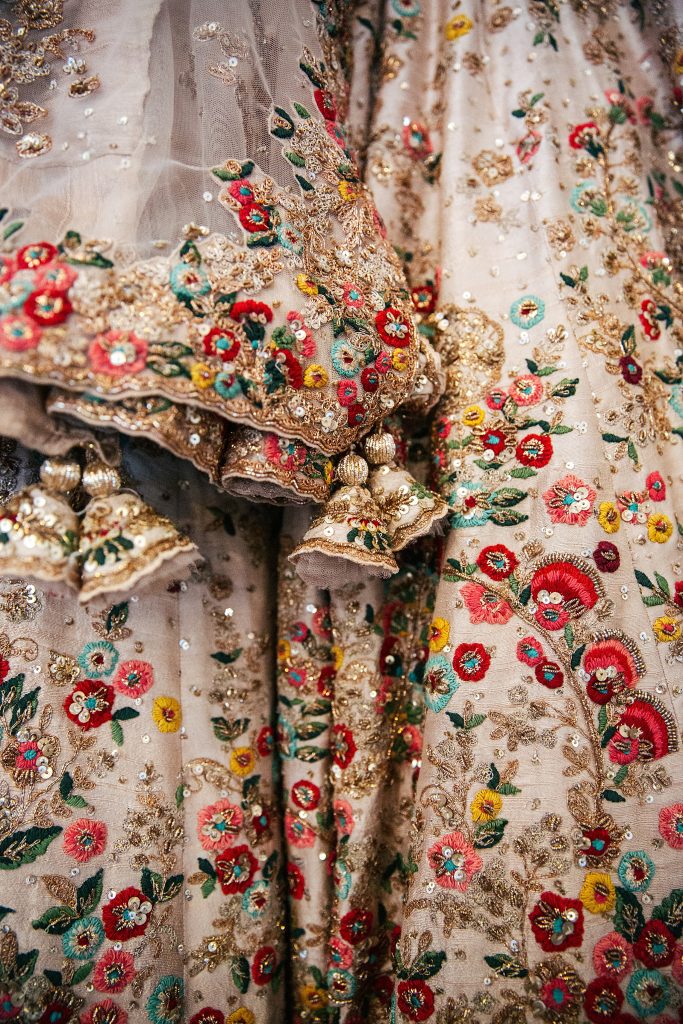 Bride's Lehnega with colourful floral embroidery and sequin detail