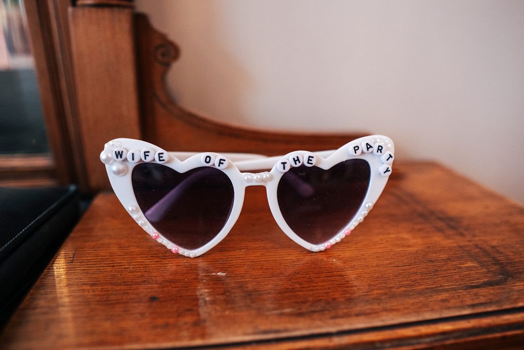 white heart shaped sunglasses 'wife of the party'