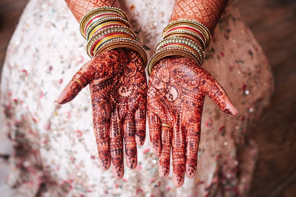 close up of henna detail on brides palms