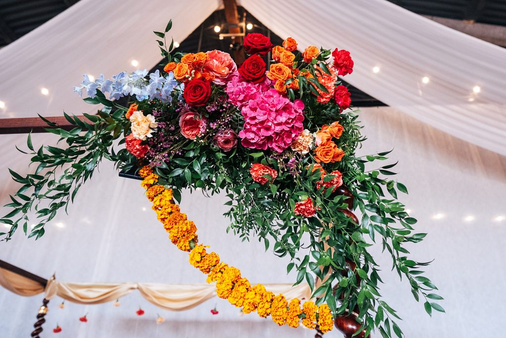 Bright floral detail on corner of Mandap