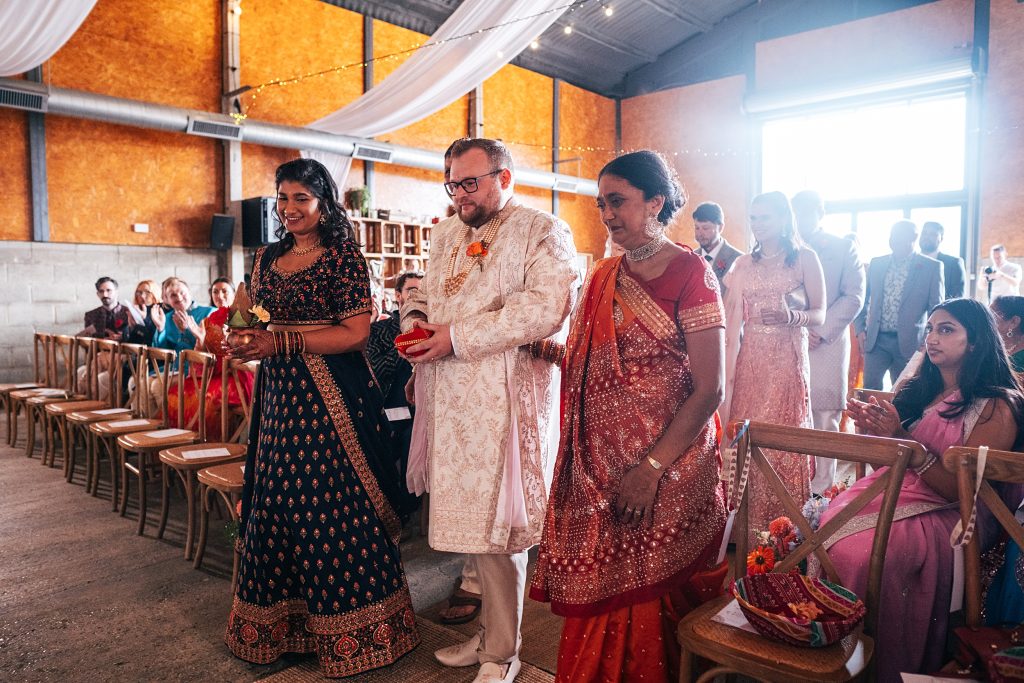 Groom with bride's family during Baraat