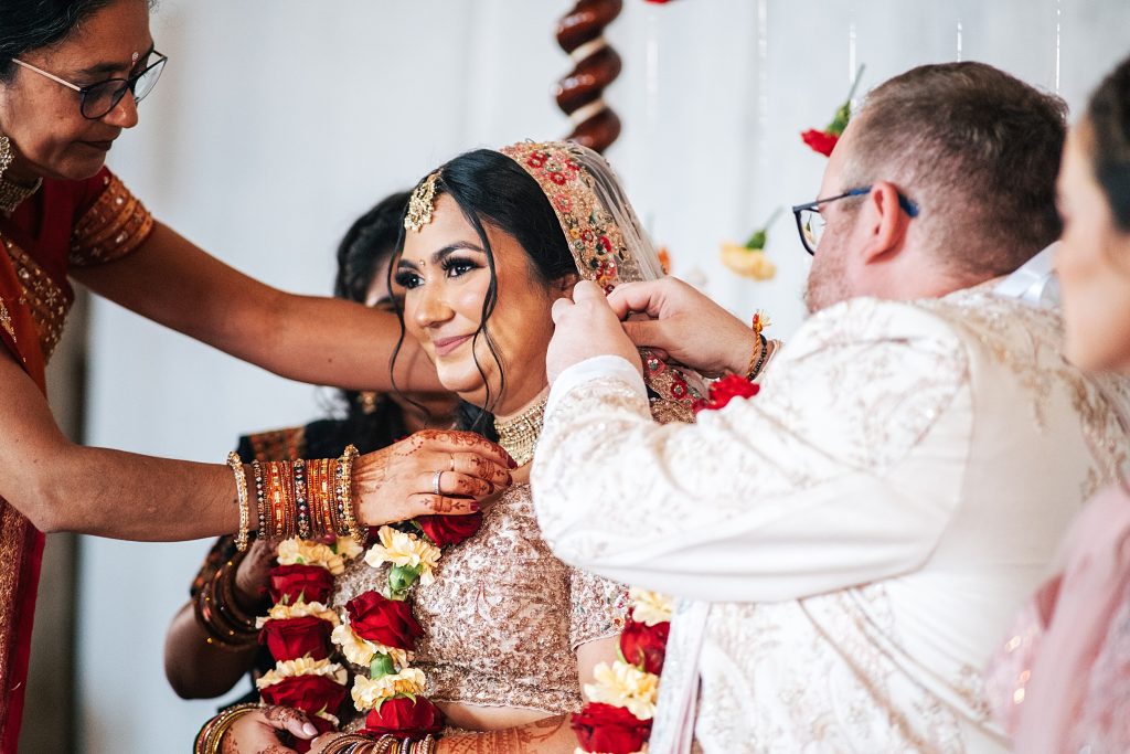 Bride smiles during Kanyadaan