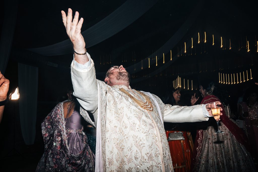 groom on dance floor