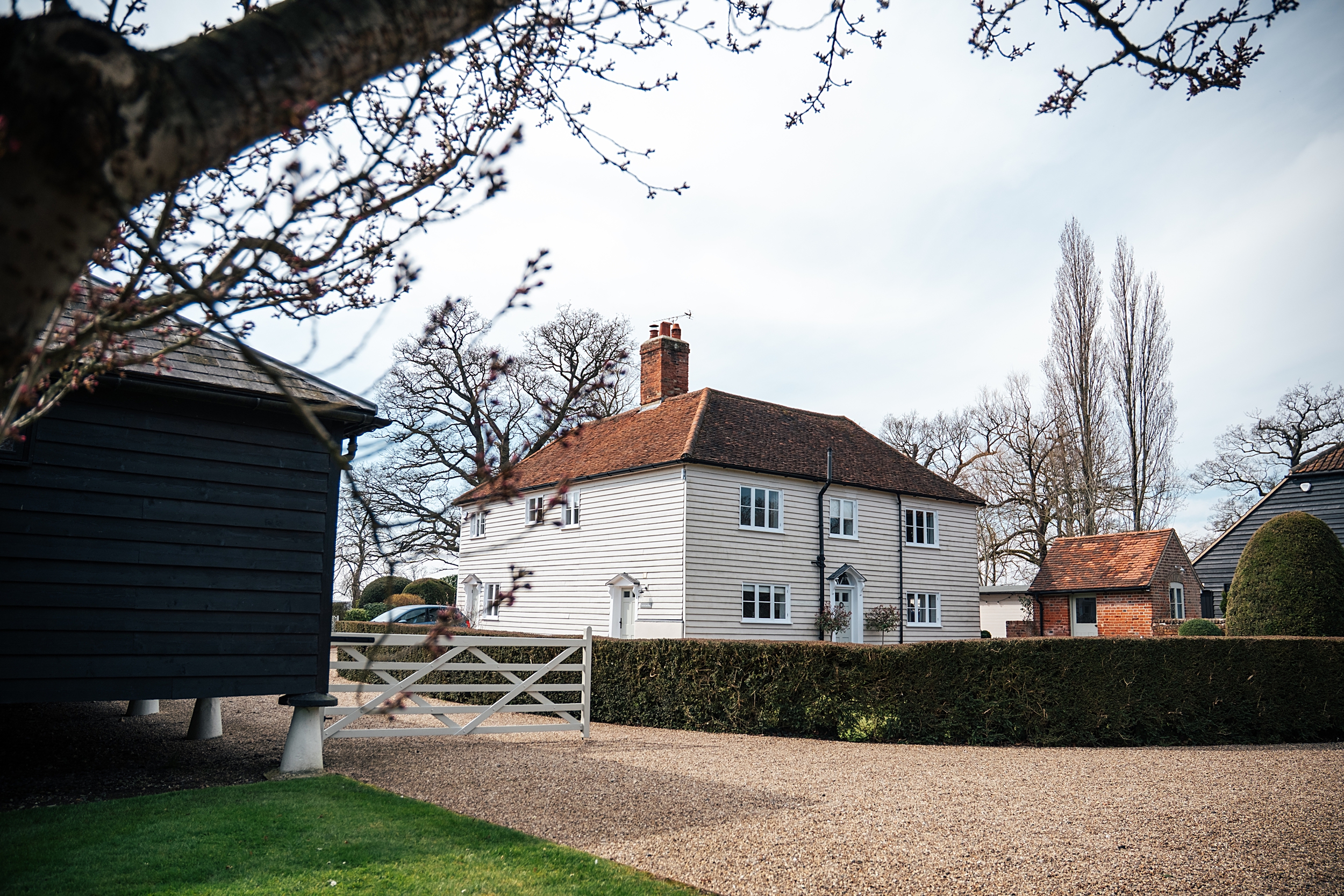 Spring wedding at Blake Hall with bright colour palette bride and groom bring dog Essex documentary wedding photographer
