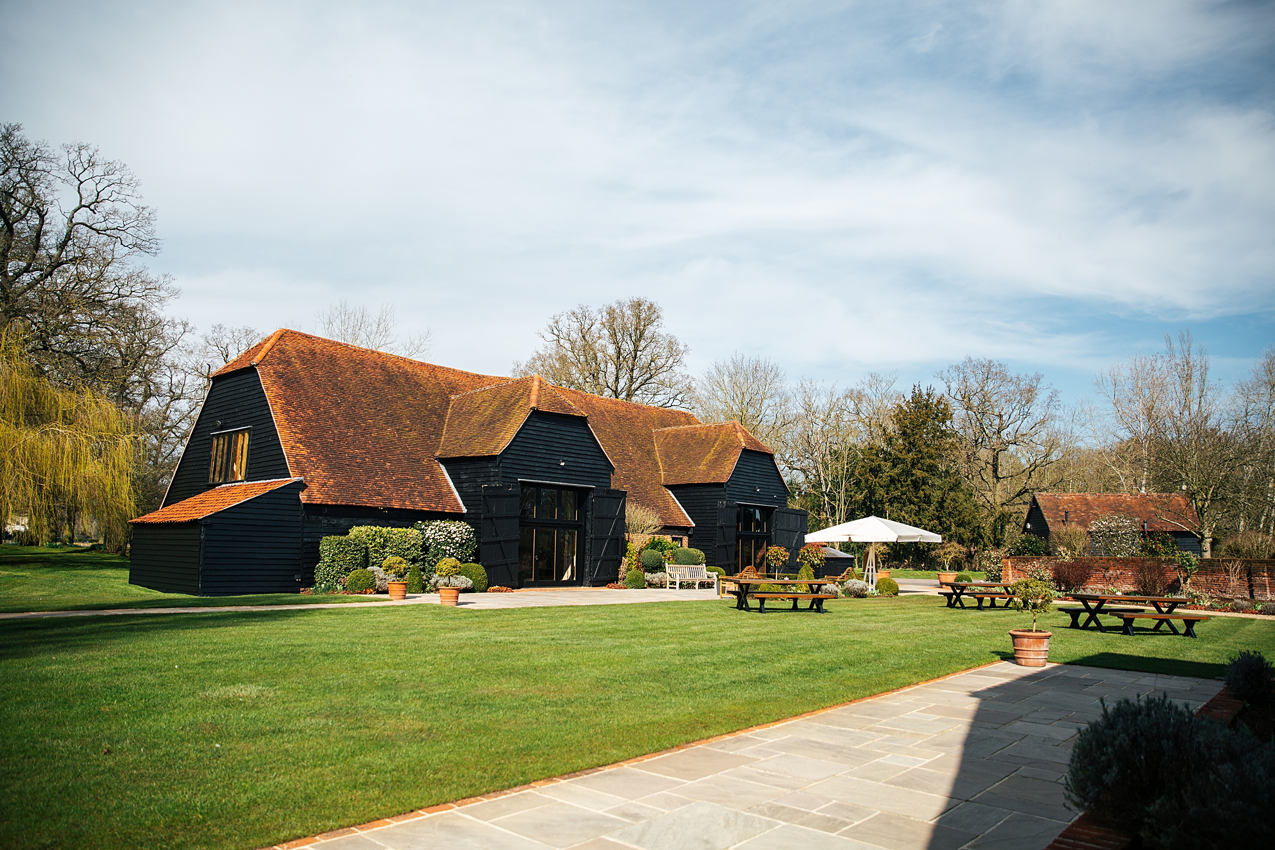 Spring wedding at Blake Hall with bright colour palette bride and groom bring dog Essex documentary wedding photographer