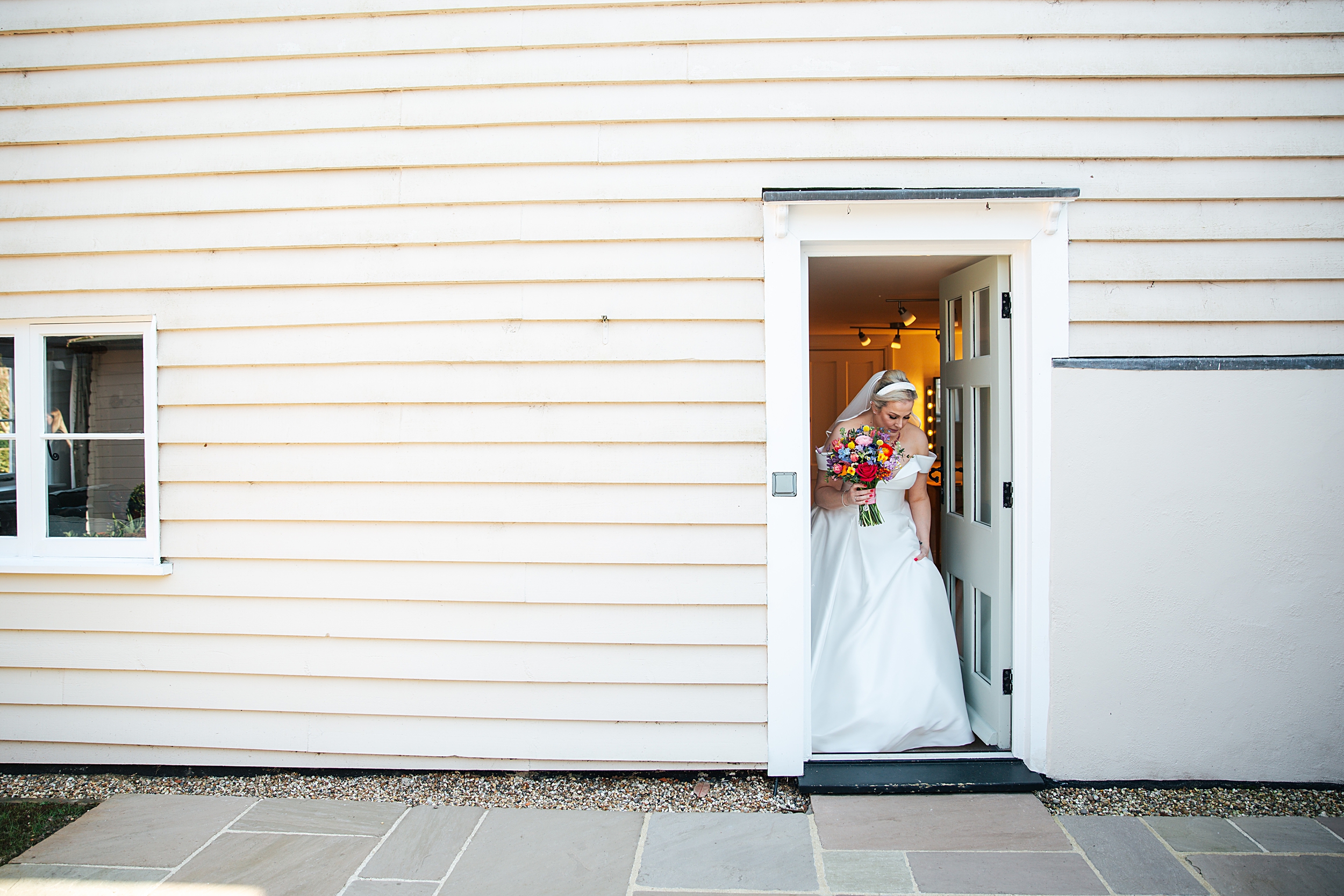 colourful Spring wedding at Blake Hall bride and groom bring dog Essex