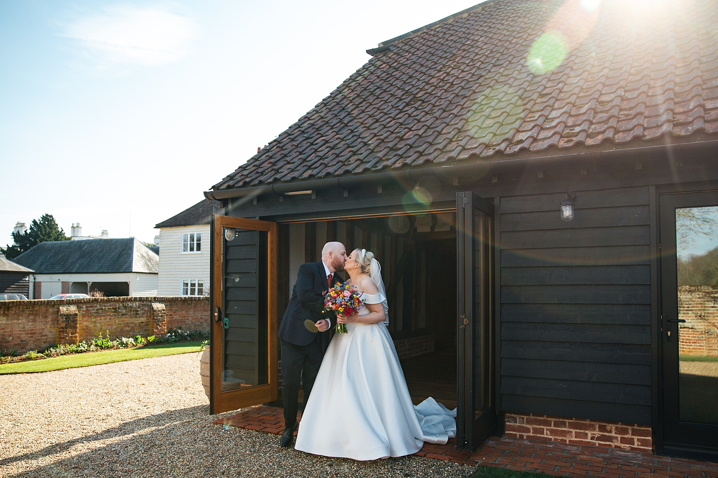 colourful Spring wedding at Blake Hall bride and groom bring dog Essex