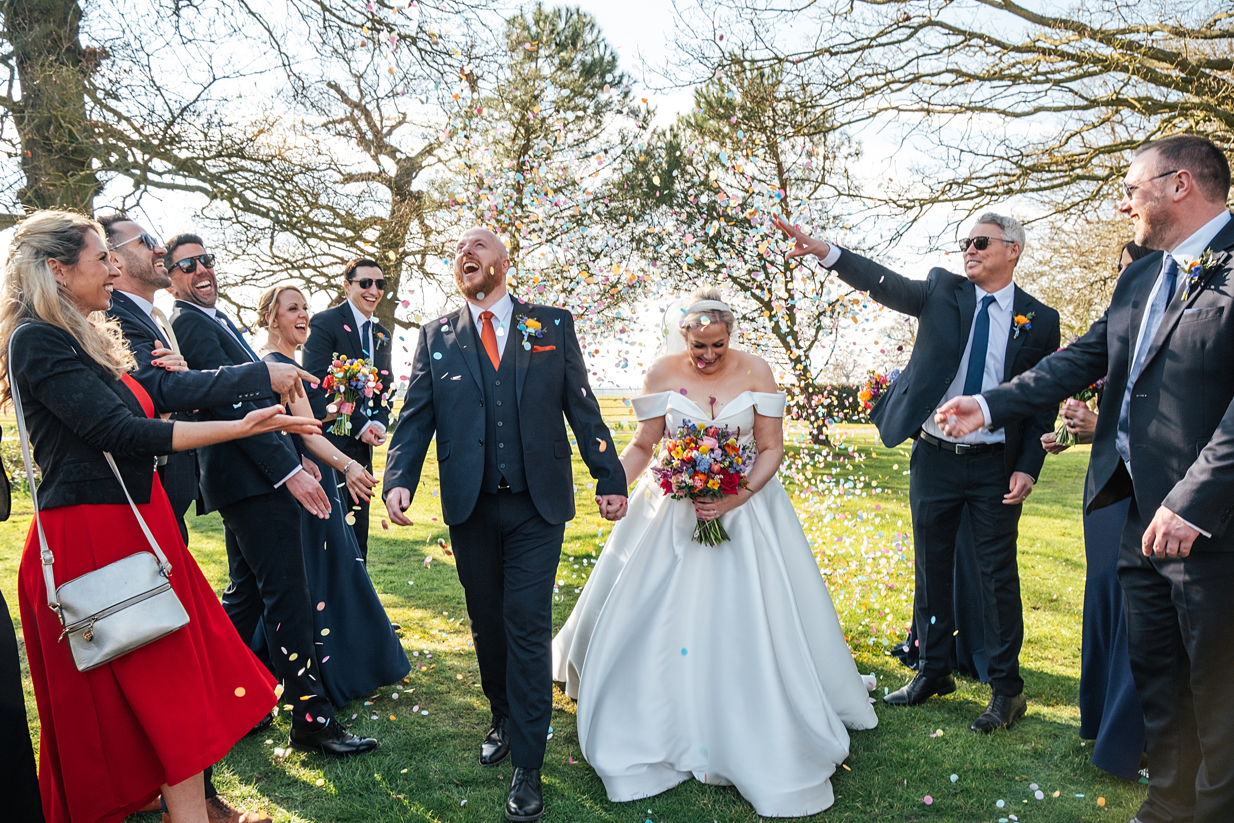 Colourful Spring wedding at Blake Hall, bride and groom bring dog. Essex documentary wedding photographer