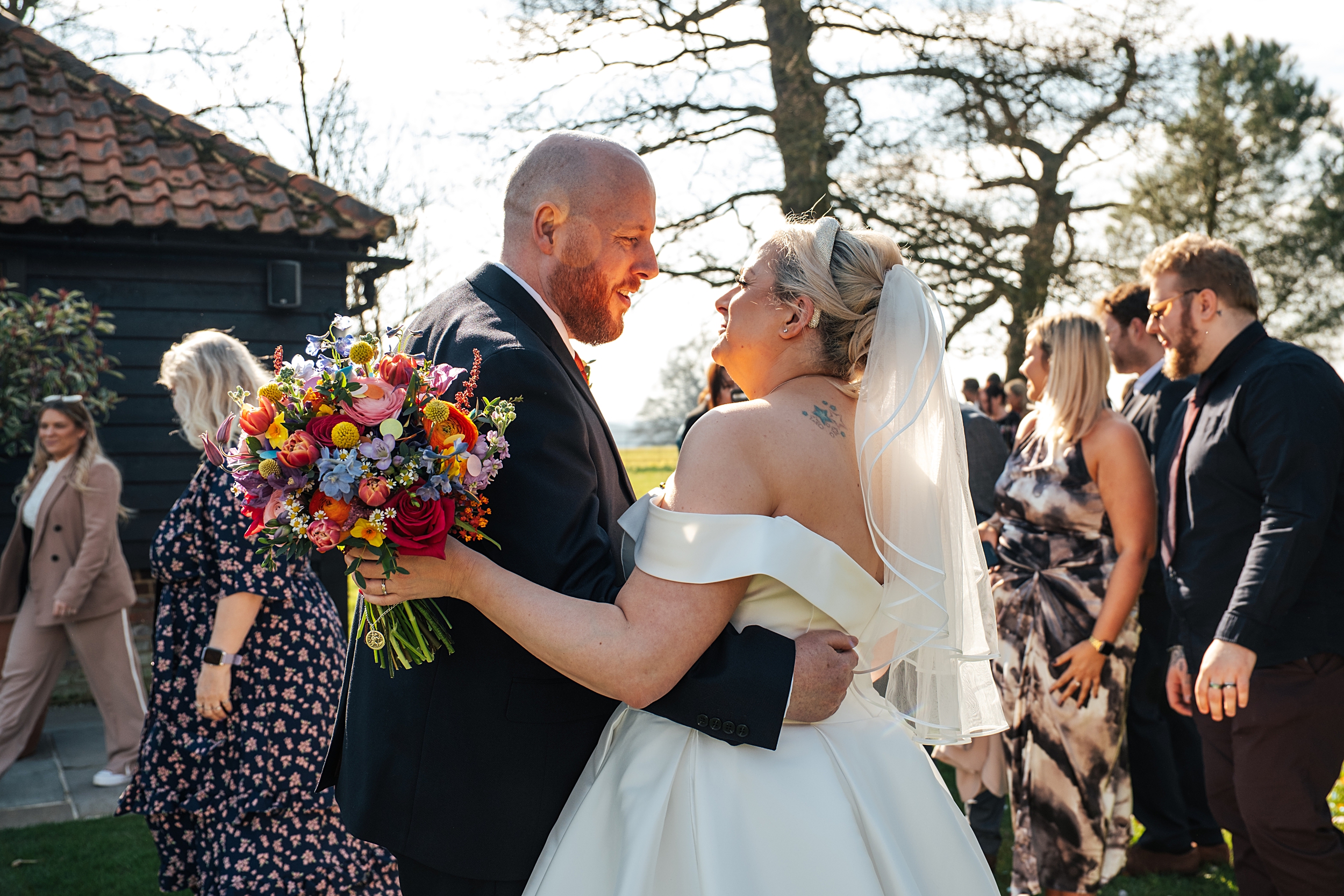 Spring wedding at Blake Hall with bright colour palette bride and groom bring dog Essex documentary wedding photographer