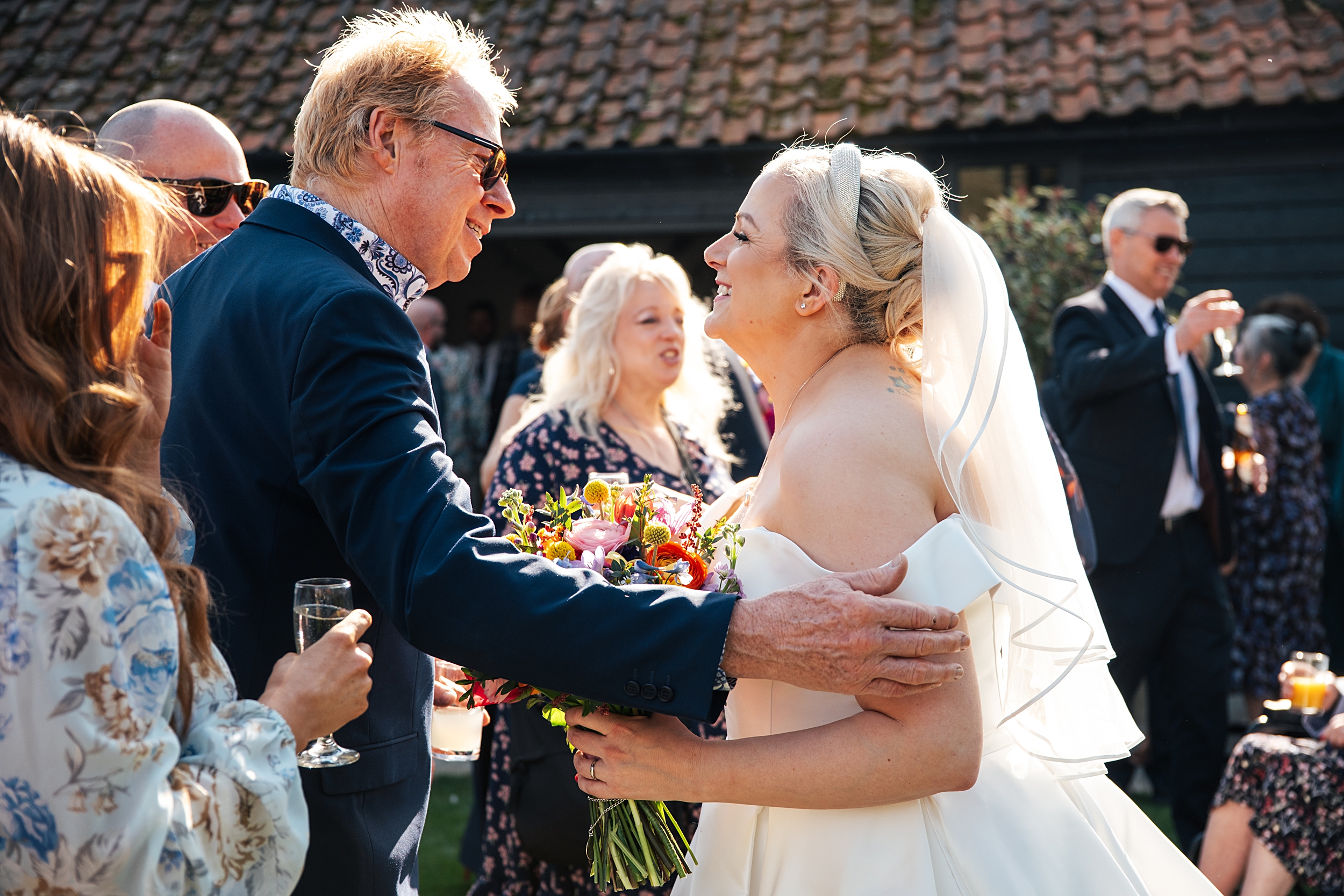 Spring wedding at Blake Hall with bright colour palette bride and groom bring dog Essex documentary wedding photographer
