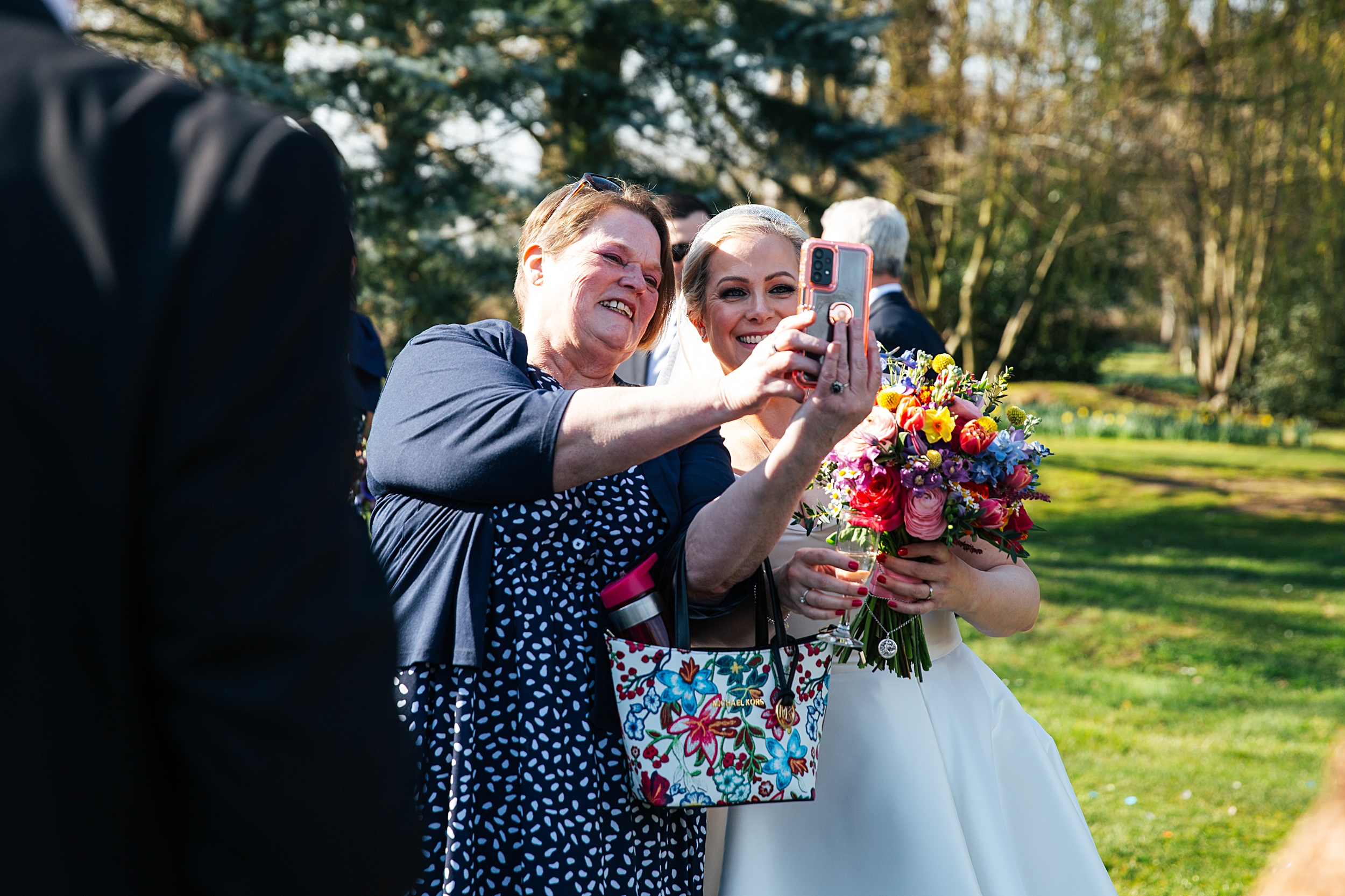 Spring wedding at Blake Hall with bright colour palette bride and groom bring dog Essex documentary wedding photographer