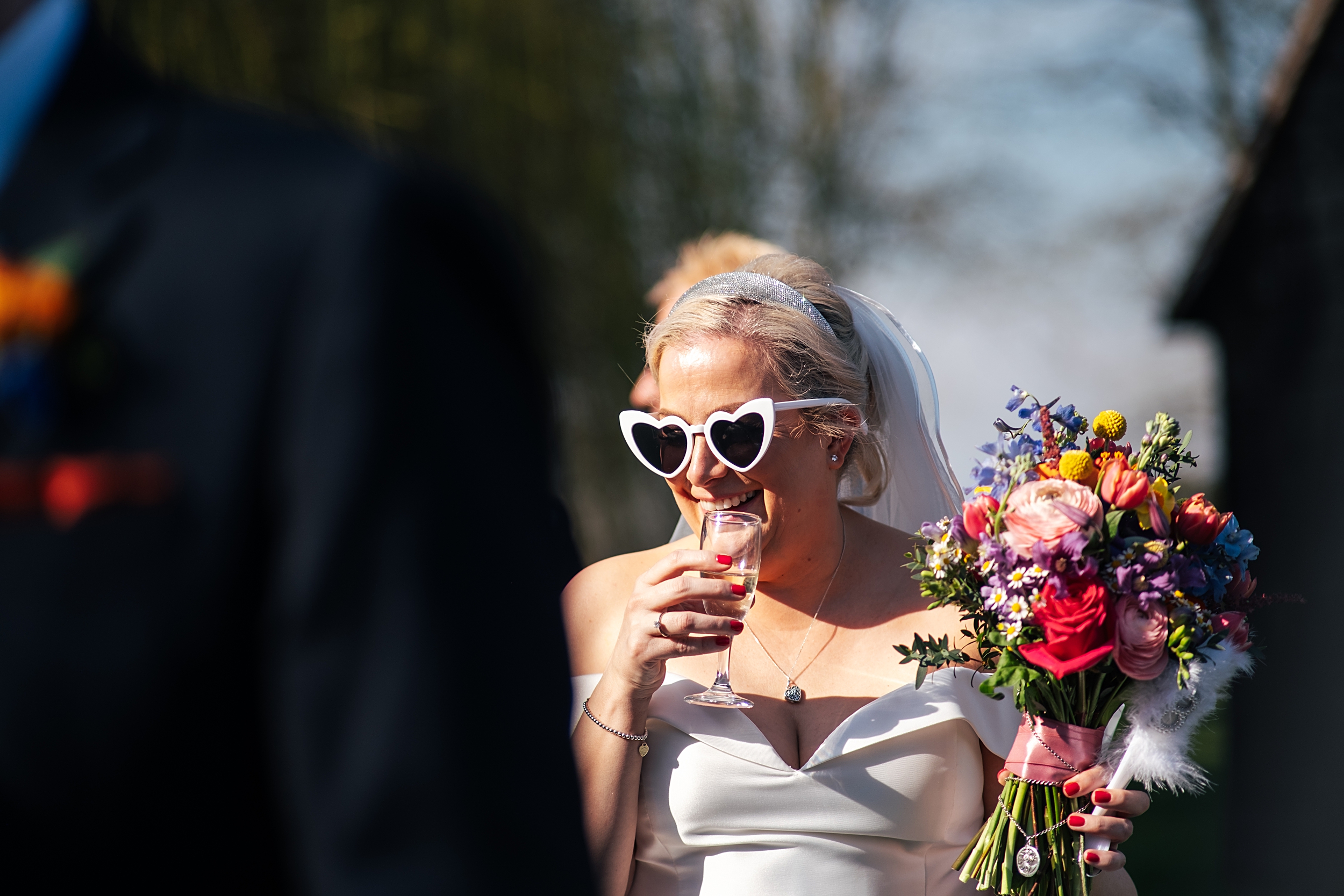 colourful Spring wedding at Blake Hall bride and groom bring dog Essex