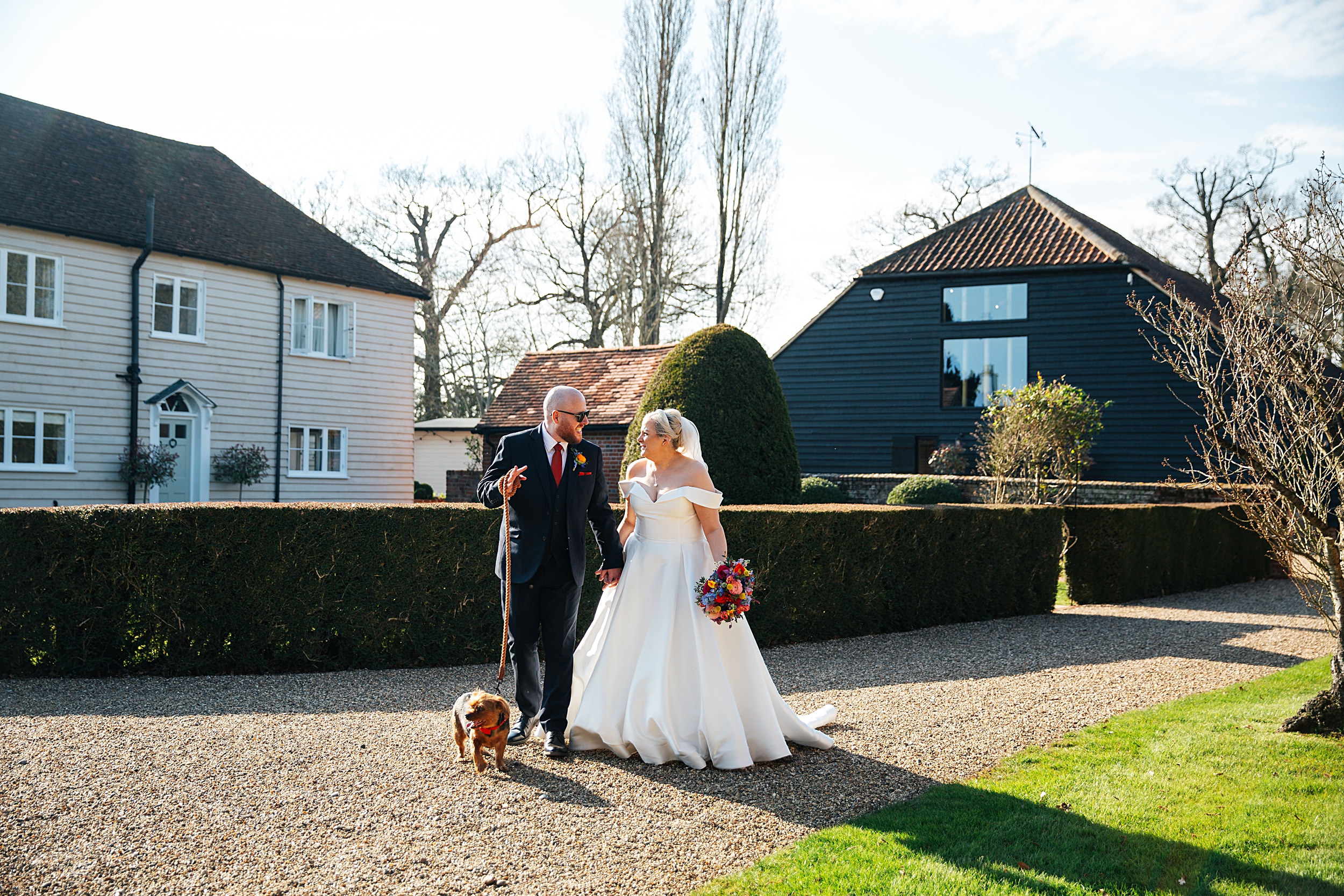 colourful Spring wedding at Blake Hall bride and groom bring dog Essex