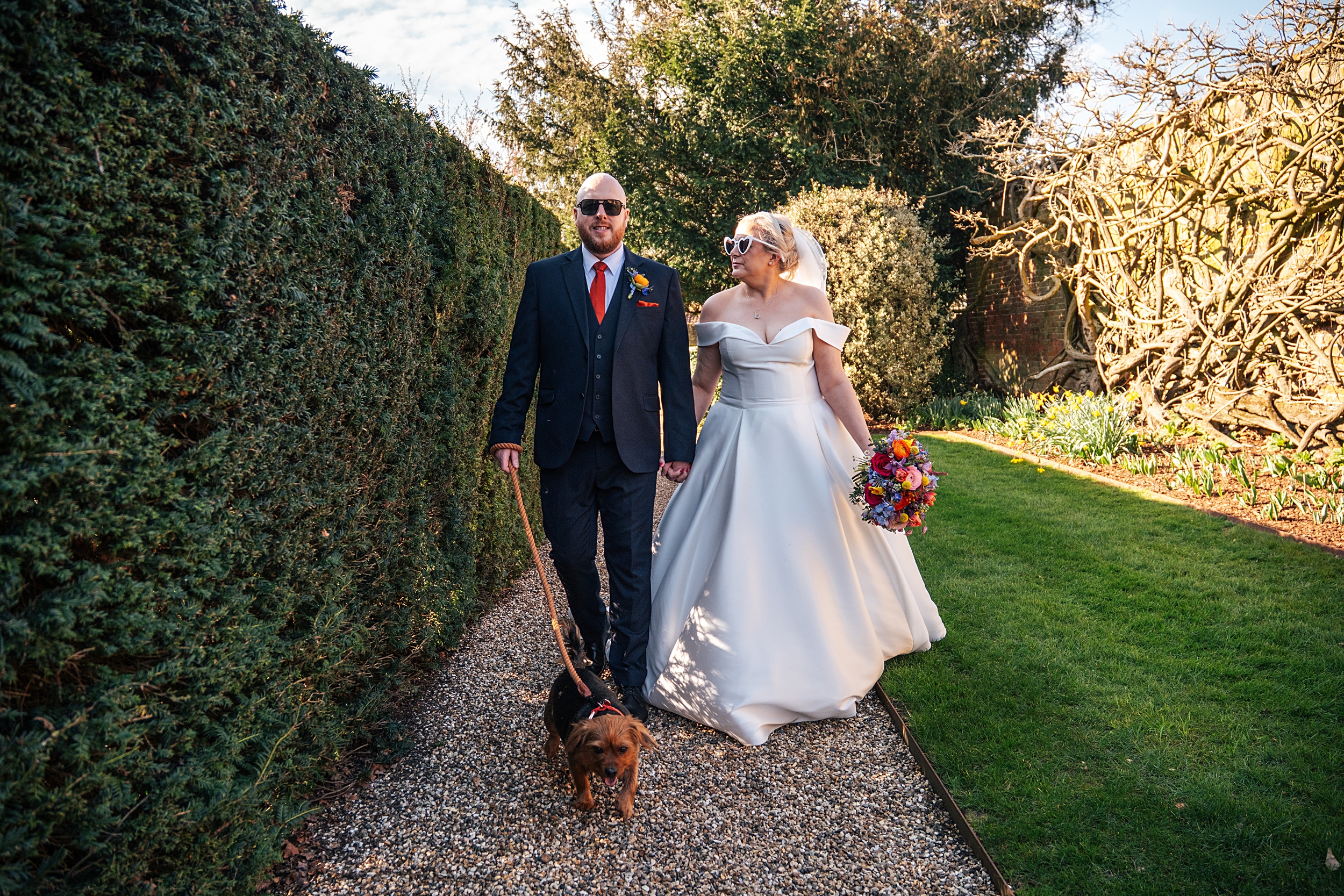 colourful Spring wedding at Blake Hall bride and groom bring dog Essex
