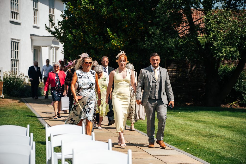 Summer wedding outdoors at Vaulty Manor Essex documentary wedding photographer